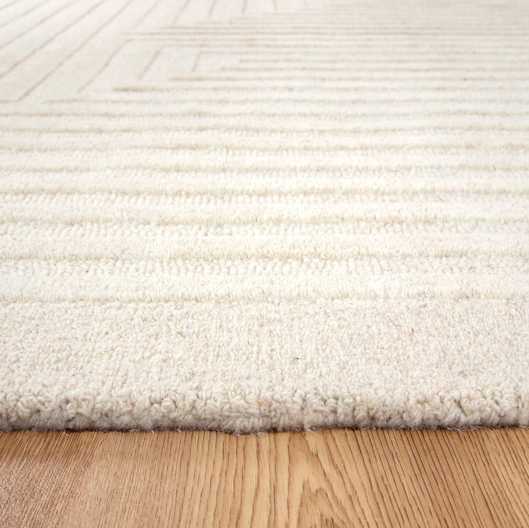 Les Nomades Felix Ivory Wool Rug
