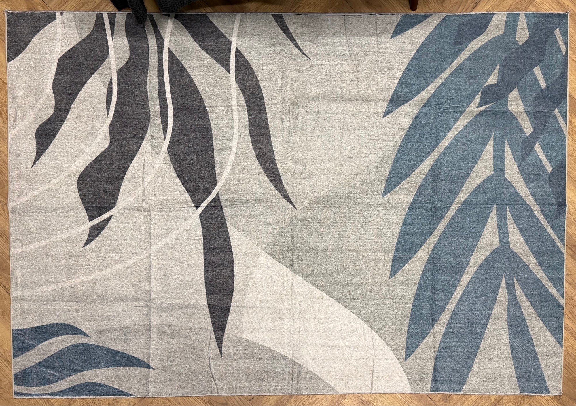 Vela Blue Leaf Machine Washable Rug