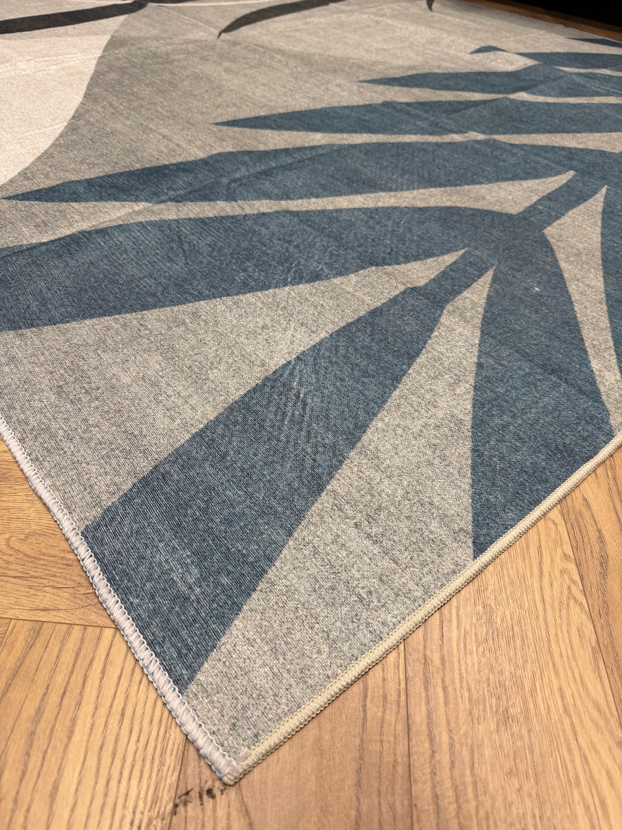 Vela Blue Leaf Machine Washable Rug