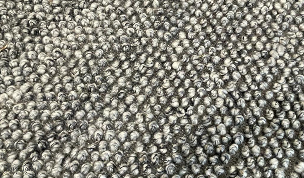 Avani Dark Grey Stone Loop Round Rug