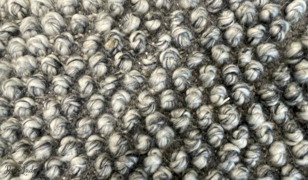 Avani Dark Grey Stone Loop Round Rug
