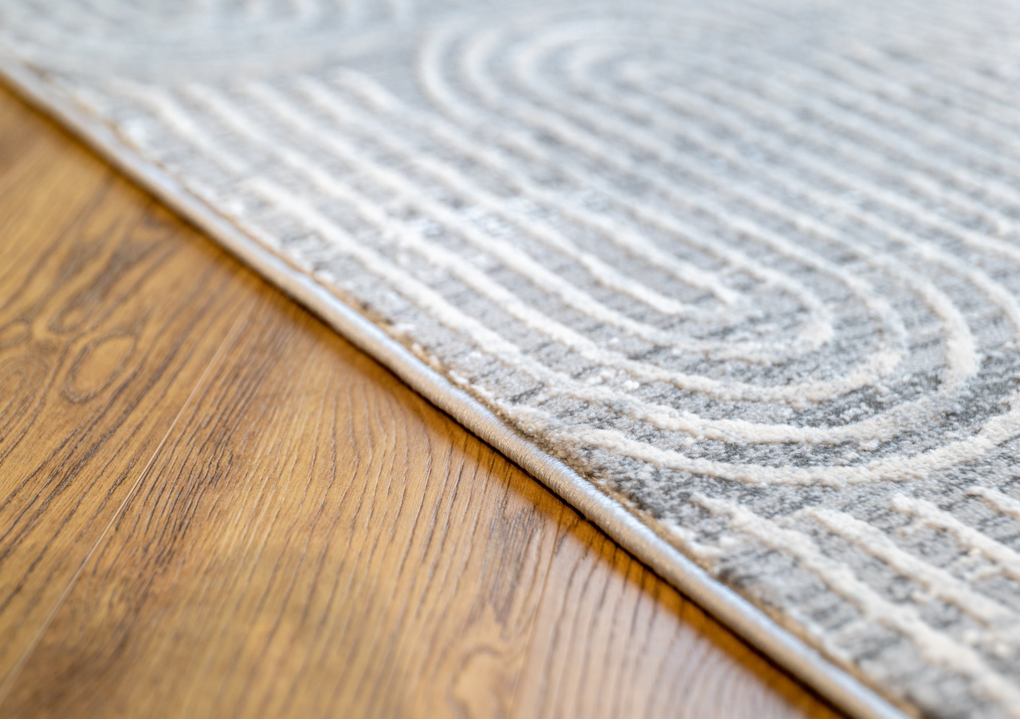 Deluxe modern arched grey beige floor rug