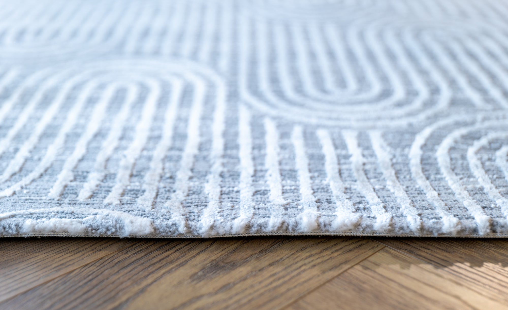 Deluxe modern arched grey beige floor rug
